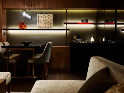 a dining room with a table and chairs at Mitsui Garden Hotel Roppongi Tokyo Premier in Tokyo