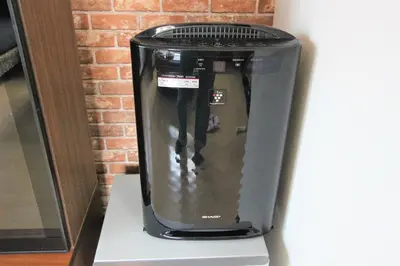 a black appliance sitting on a counter next to a brick wall at Hotel EL Shinjuku 1 free parking in Tokyo