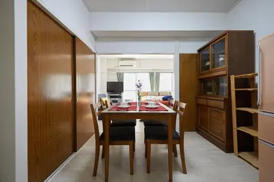 a dining room with a table and chairs at G&R House 102 in Tokyo