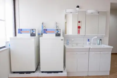 a laboratory with two refrigerators and a sink at \u532f\u91d1\u6d45\u8349\u4e00\u53f7\u9928 in Tokyo
