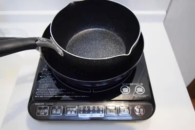 a frying pan sitting on top of a scale at 3 min to Komagome Sta by foot, 15-minute to Shinju, Tokyo station by JR in Tokyo