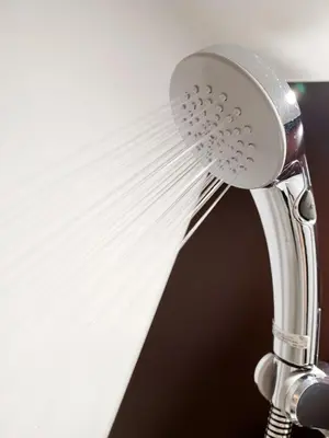 a hair dryer is being used to clean a window at Akasaka Urban Hotel Annex in Tokyo