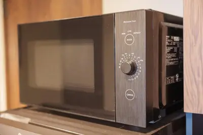 a microwave oven sitting on top of a counter at PREMIER suite Shinjuku West 2F in Tokyo
