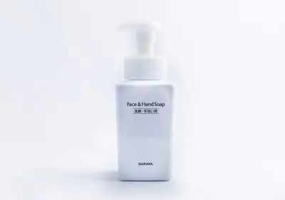 a white bottle of moisturizing cream on a white background at APA Hotel Ginza Shintomicho Ekimae in Tokyo