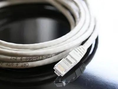 a close up of a camera strap on top of a camera at APA Hotel Ginza Shintomicho Ekimae in Tokyo
