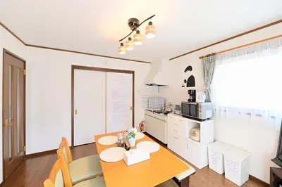 a kitchen and dining room with a table and chairs at Nerima-ku - House / Vacation STAY 3889 in Tokyo