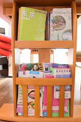 a book shelf filled with books at Nerima-ku - House / Vacation STAY 3889 in Tokyo