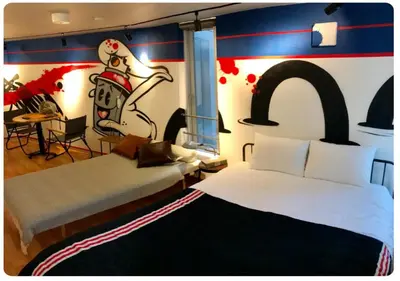 a bedroom with a large bed and a room with a table at world potential / Vacation STAY 4610 in Tokyo