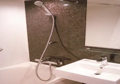a shower in a bathroom with a sink at world potential / Vacation STAY 4610 in Tokyo