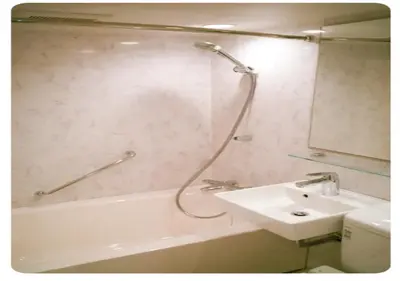 a bathroom with a sink and a tub and a shower at world potential / Vacation STAY 4611 in Tokyo