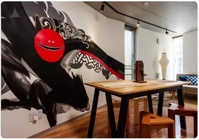 a room with a table and a painting on the wall at world potential / Vacation STAY 4613 in Tokyo