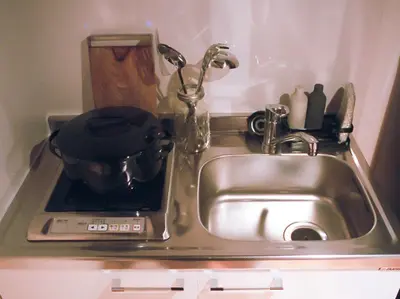 a kitchen sink with a pot on top of it at world potential / Vacation STAY 4612 in Tokyo