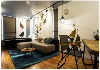 a living room with a couch and a table at world potential / Vacation STAY 4628 in Tokyo