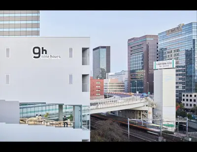 a collage of photos of a city with buildings at 9h nine hours Suidobashi in Tokyo