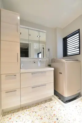 a bathroom with a tub and a large mirror at Real Life Meguro River in Tokyo