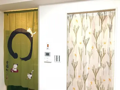 a bathroom with a shower curtain with cats on it at Julian home Shinagawa 5 mins Shibuya 7 mins in Tokyo