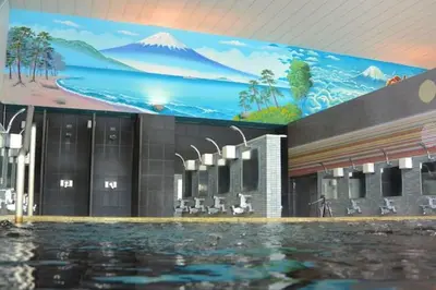 a large swimming pool with a mountain mural on the wall at Julian home Shinagawa 5 mins Shibuya 7 mins in Tokyo