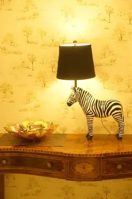 a zebra lamp on a table with a bowl of food at Himalaya Cloud Hotel in Tokyo