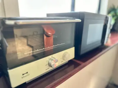a toaster oven sitting on top of a counter at Himalaya Cloud Hotel in Tokyo