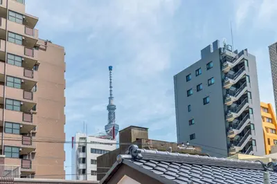 a view of a city with a tv tower in the background at Yadoya Asakusa Sennosato / Vacation STAY 46671 in Tokyo