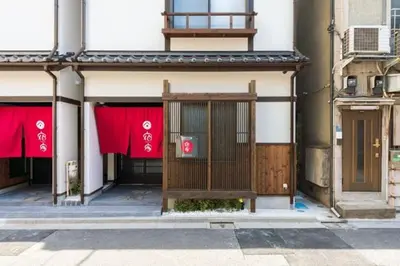a building with a gate on the side of it at Yadoya Asakusa Sennosato / Vacation STAY 46671 in Tokyo