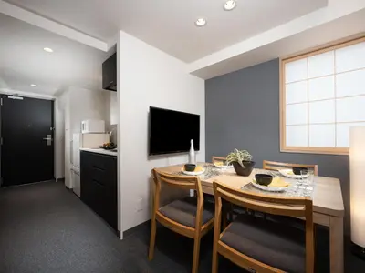 a kitchen and dining room with a table and chairs at MIMARU Tokyo Shinjuku West in Tokyo