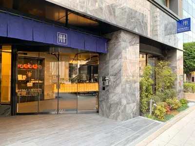 an entrance to a building with a glass door at MIMARU Tokyo Shinjuku West in Tokyo