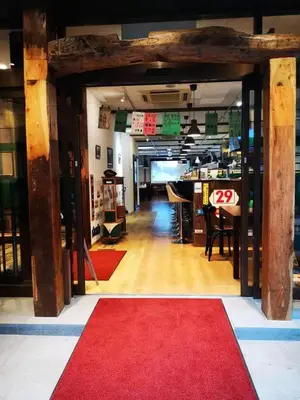 a room with a red carpet and a red rug at \u90fd\u96fb\u5c4b TodenHotel in Tokyo