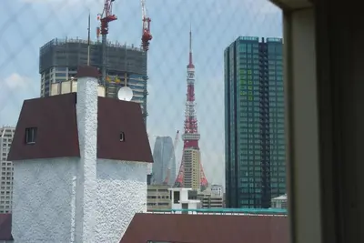 a view of a city skyline with tall buildings at Olympic Inn Azabu in Tokyo