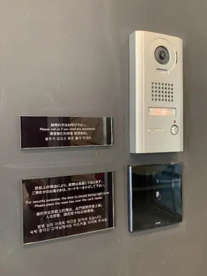 a toaster oven and a microwave on a wall at HOTEL TAVINOS Hamamatsucho - Vacation STAY 51015 in Tokyo