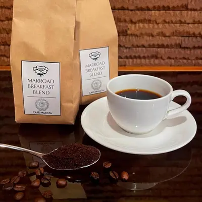 a cup of coffee and a bag of coffee beans at Marroad Inn Akasaka in Tokyo