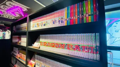 a shelf full of childrens books in a store at HOTEL TAVINOS Asakusa in Tokyo