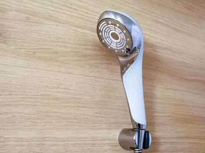 a close up of a scooter on a wooden table at Hotel Mystays Premier Hamamatsucho in Tokyo