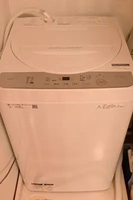 a close up of a toilet in a bathroom at OMM STAY in Tokyo