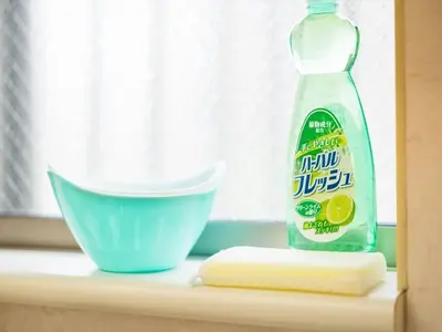 a bottle of detergent next to a bowl and a container of butter at Katsushika Takasago House in Tokyo