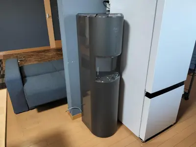a trash can in a room next to a door at Katsushika Takasago House in Tokyo