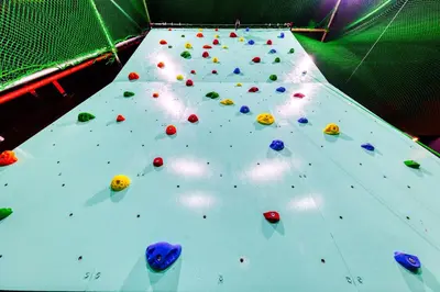 a close up of a climbing wall in an indoor climbing gym at HOTEL Lotus Ikebukuro (Adult Only) in Tokyo