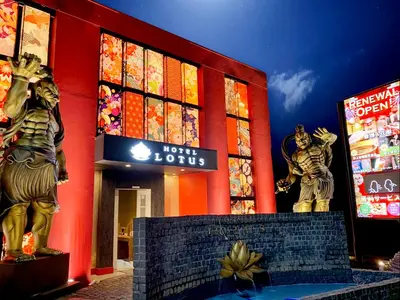 a building with two statues in front of it at HOTEL Lotus Ikebukuro (Adult Only) in Tokyo