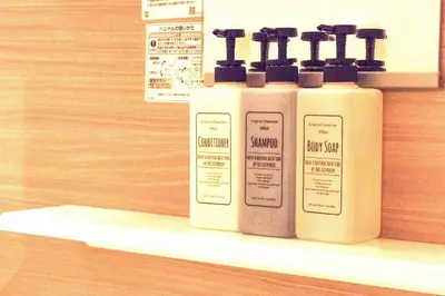two bottles of soap sitting on a shelf at Akabane TK Building 103 in Tokyo