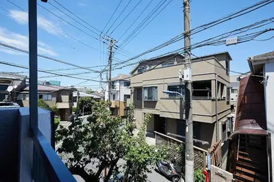 a view of an apartment building from the street at Akabane TK Building 201 in Tokyo
