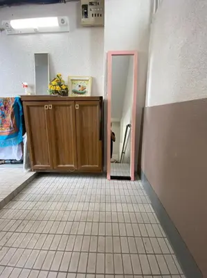 a room with a cabinet and a door in a room at Takemura Building 301 in Tokyo