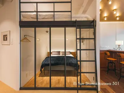 a bedroom with a bunk bed in a room at illi Sun Shimokitazawa in Tokyo
