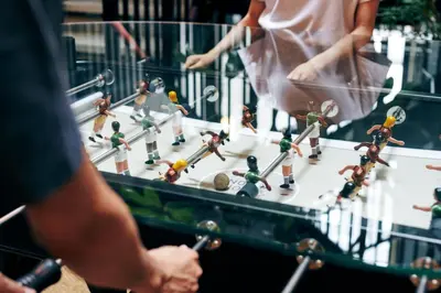 a group of people looking at miniature figurines on a table at NOHGA HOTEL AKIHABARA TOKYO in Tokyo