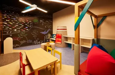 a childrens play room with a table and chairs at Tokyo Bay Shiomi Prince Hotel in Tokyo