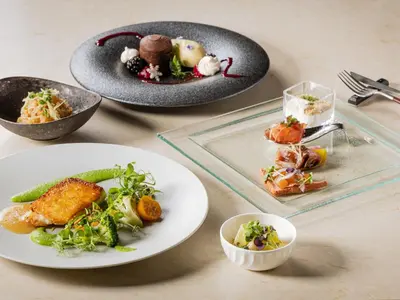 a table with plates of food and bowls of food at Tokyo Bay Shiomi Prince Hotel in Tokyo
