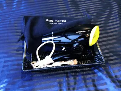a black bag with a pair of controllers in it at HOTEL LiVEMAX Nihonbashi Koamicho in Tokyo