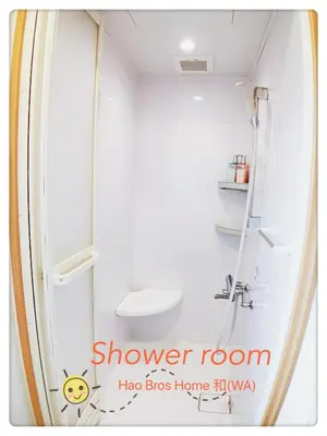 a shower room with a sink and a shower door at Hao Bros. Home \u548c(WA) in Tokyo