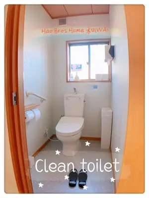 a small bathroom with a toilet and a window at Hao Bros. Home \u548c(WA) in Tokyo