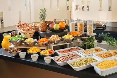 a buffet with many different types of food on a table at Hotel Vista Tokyo Tsukiji in Tokyo