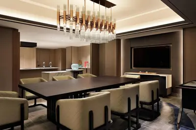 a dining room with a large table and chairs at mesm Tokyo, Autograph Collection in Tokyo